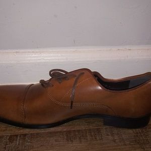 A brown dressy men shoes